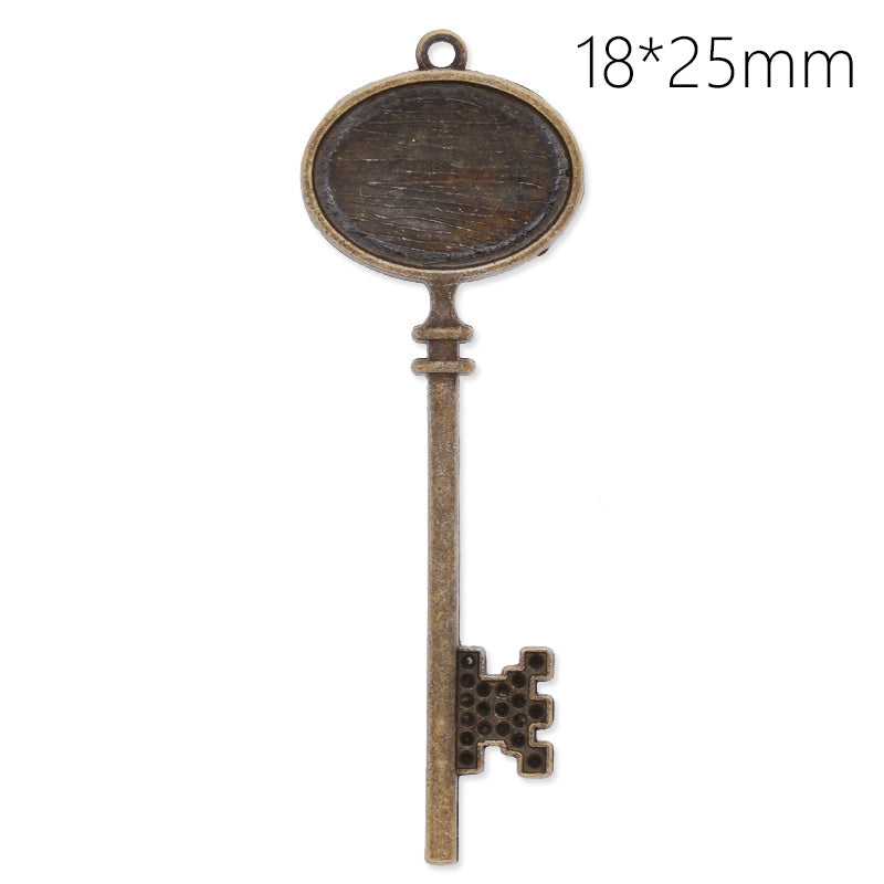Antique Bronze key pendant tray with 18x25mm oval bezel,length:82mm,10pcs/lot